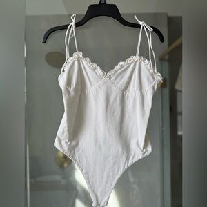 Penelope Bodysuit in White
SUPERDOWN from REVOLVE